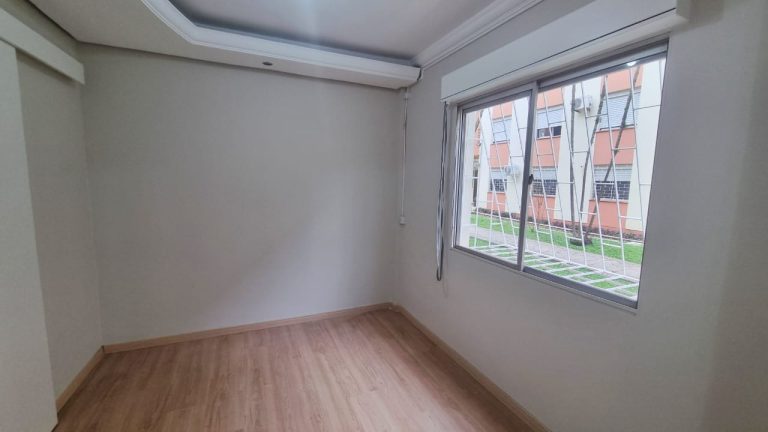 APARTAMENTO COM 3 DORMITÓRIOS TRANSFORMADO EM DOIS DORMITÓRIOS, UMA VAGA DE GARAGEM ROTATIVA, SÃO LEOPOLDO