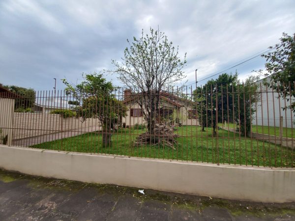 CASA COM 4 DORMITÓRIOS, SENDO UM SUÍTE, GARAGEM, NO PÁTRIA NOVA