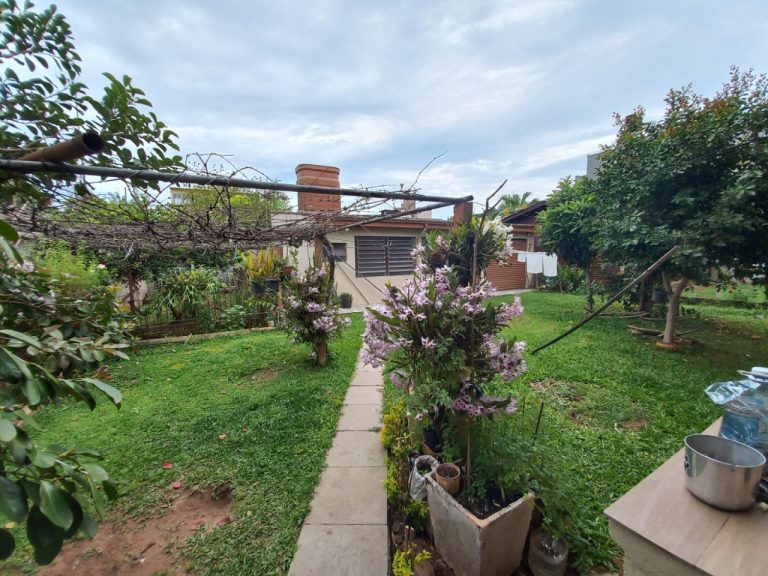 CASA COM 4 DORMITÓRIOS, SENDO UM SUÍTE, GARAGEM, NO PÁTRIA NOVA