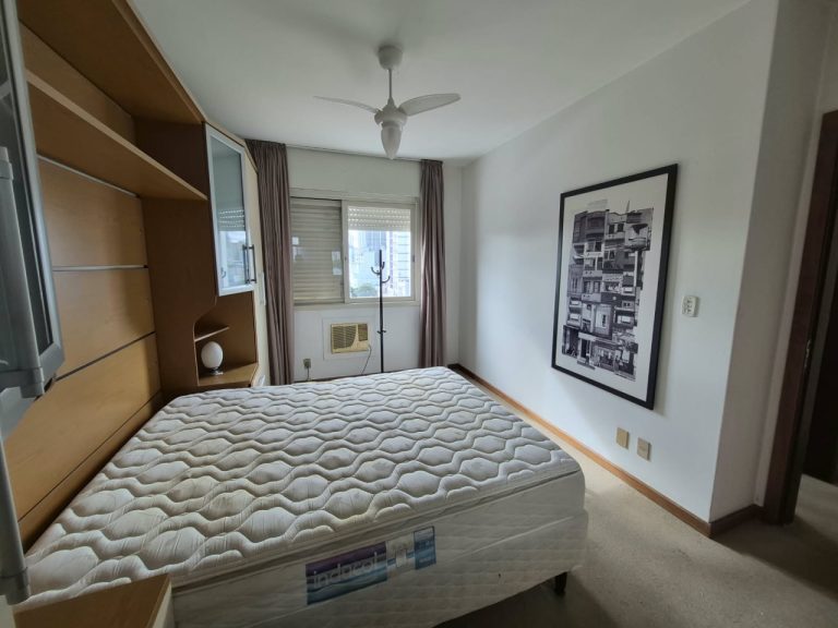 APARTAMENTO DOIS DORMITÓRIOS COM SUÍTE E GARAGEM NO CENTRO