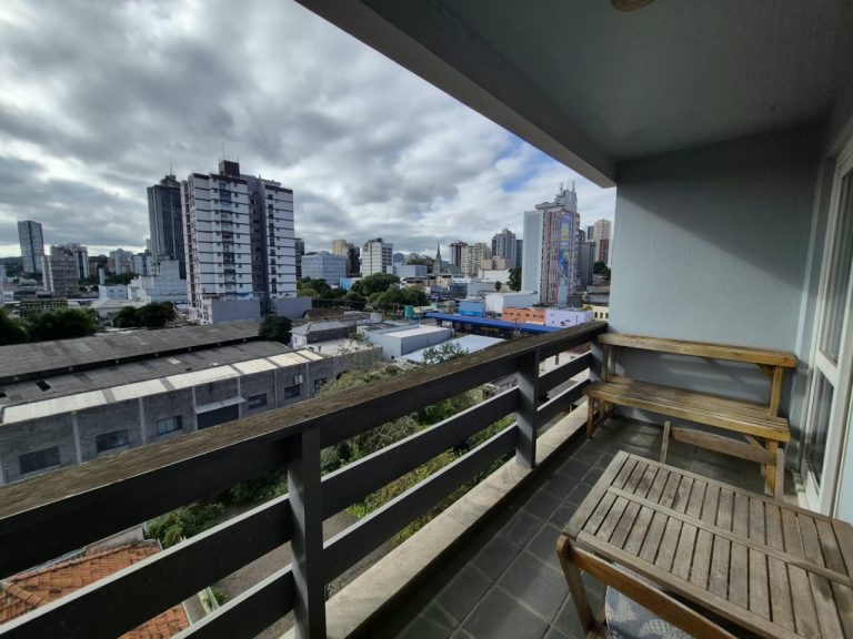 APARTAMENTO DOIS DORMITÓRIOS COM SUÍTE E GARAGEM NO CENTRO