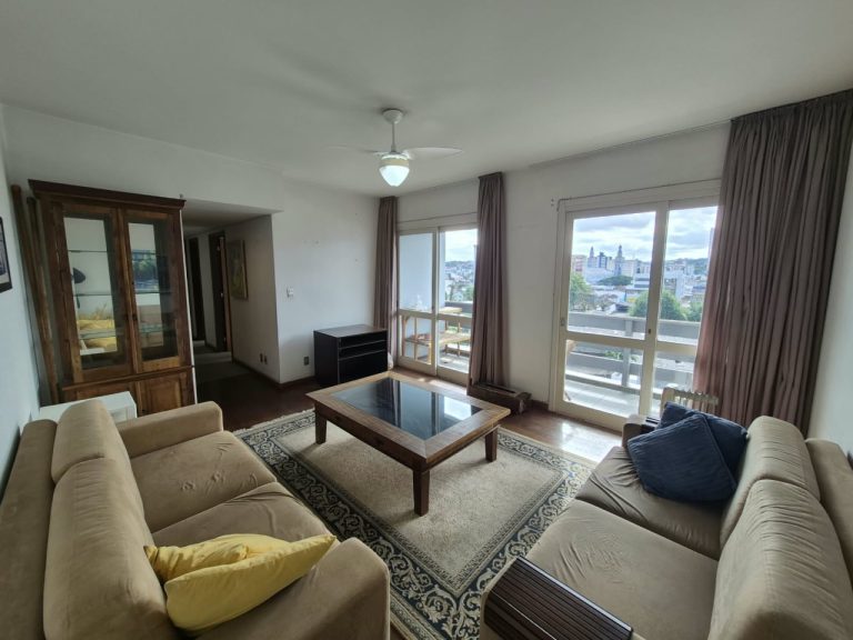 APARTAMENTO DOIS DORMITÓRIOS COM SUÍTE E GARAGEM NO CENTRO