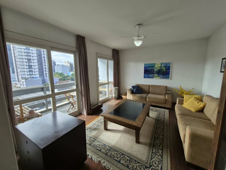 APARTAMENTO DOIS DORMITÓRIOS COM SUÍTE E GARAGEM NO CENTRO