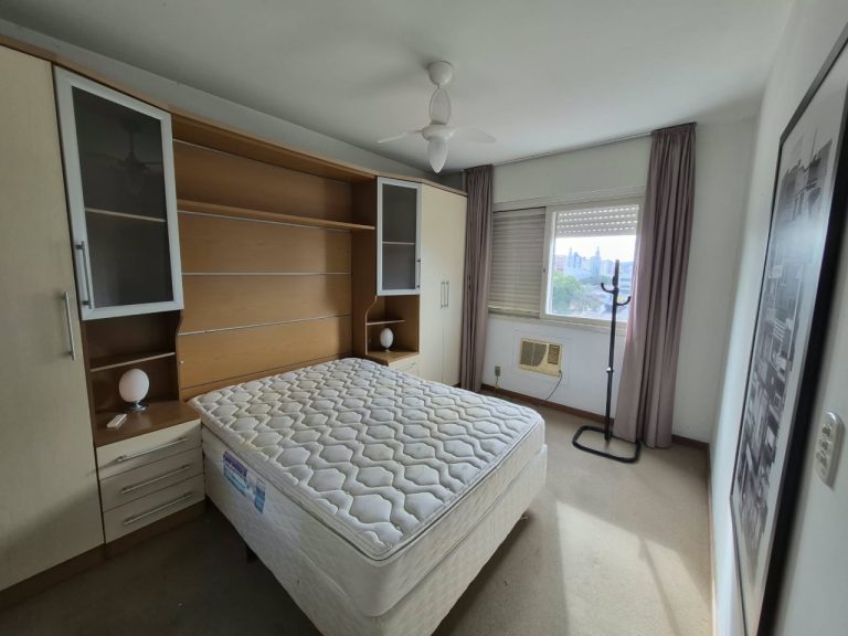 APARTAMENTO DOIS DORMITÓRIOS COM SUÍTE E GARAGEM NO CENTRO
